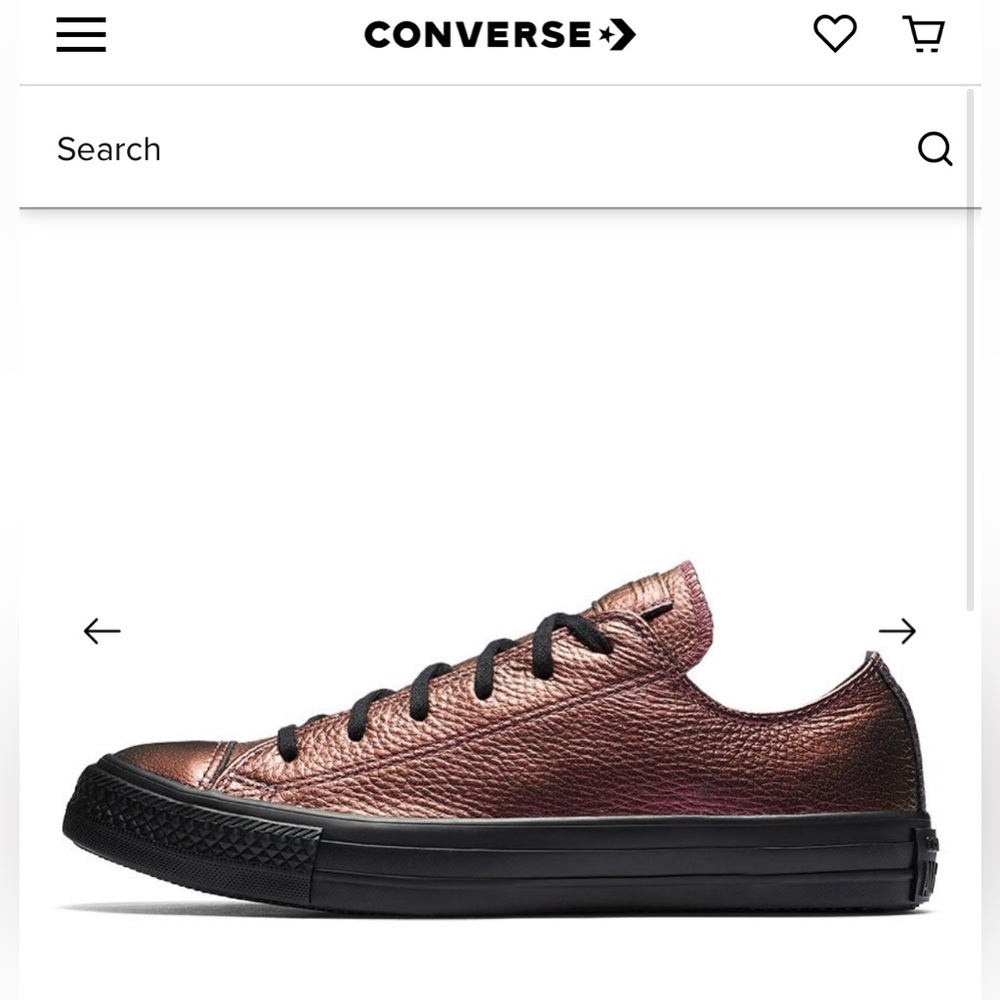 VGUC iridescent purple leather Converse all stars with black rubber sole.